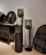 Three glass lanterns with candles