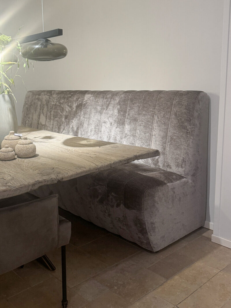 Modern dining room with comfortable sofa.