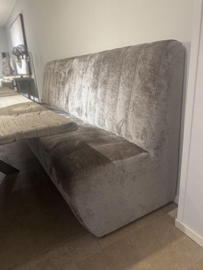 Modern, comfortable bench at a table