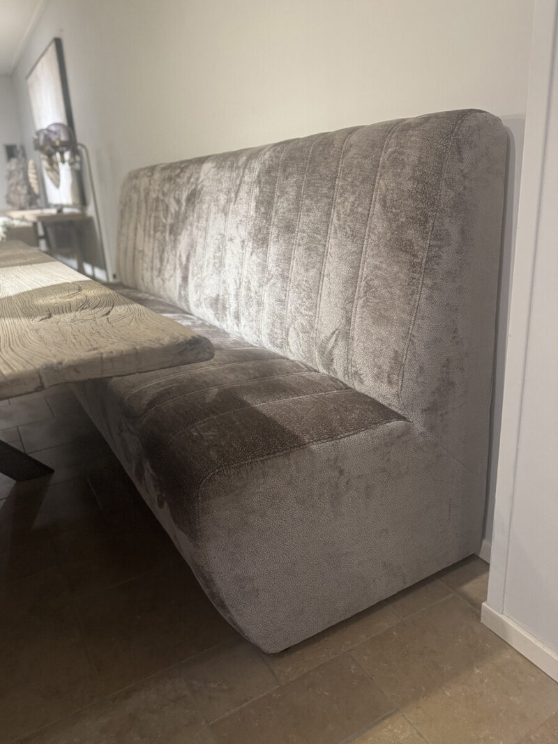 Modern, comfortable bench at a table