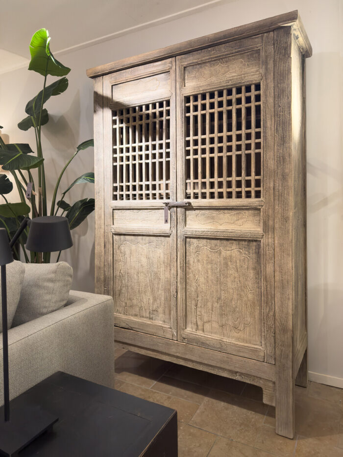 Antique cupboard with lattice panel door