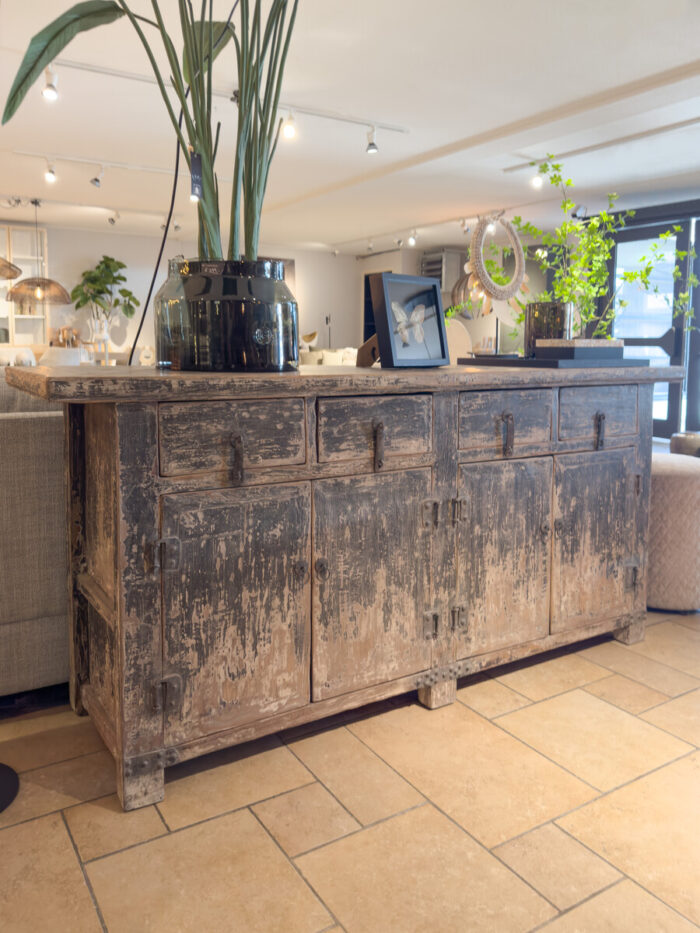 Antique sideboard with weathered patina