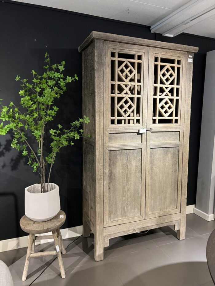 Antique cupboard with lattice panel door