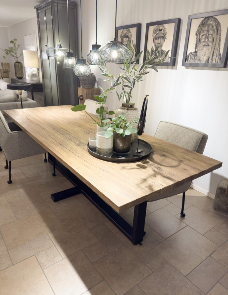 Wooden table with decorative plants