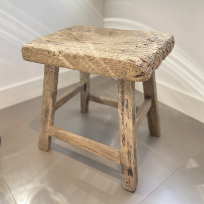 Wooden stool with a rustic look