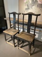 Two old wooden chairs.