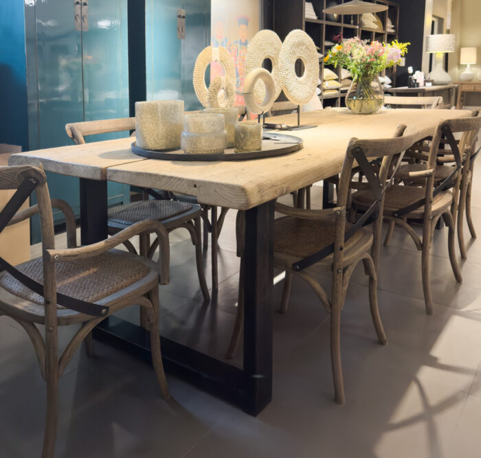 Wooden table with chairs and decoration