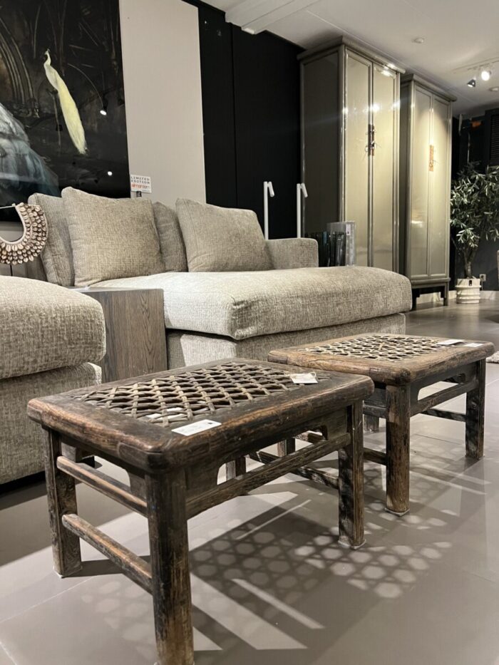 Two wooden stools and a bench