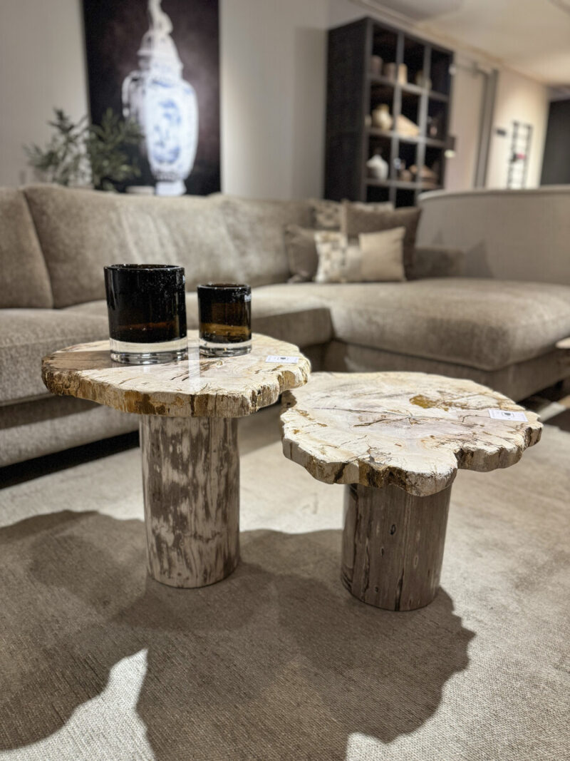 Two wooden tables with glasses.