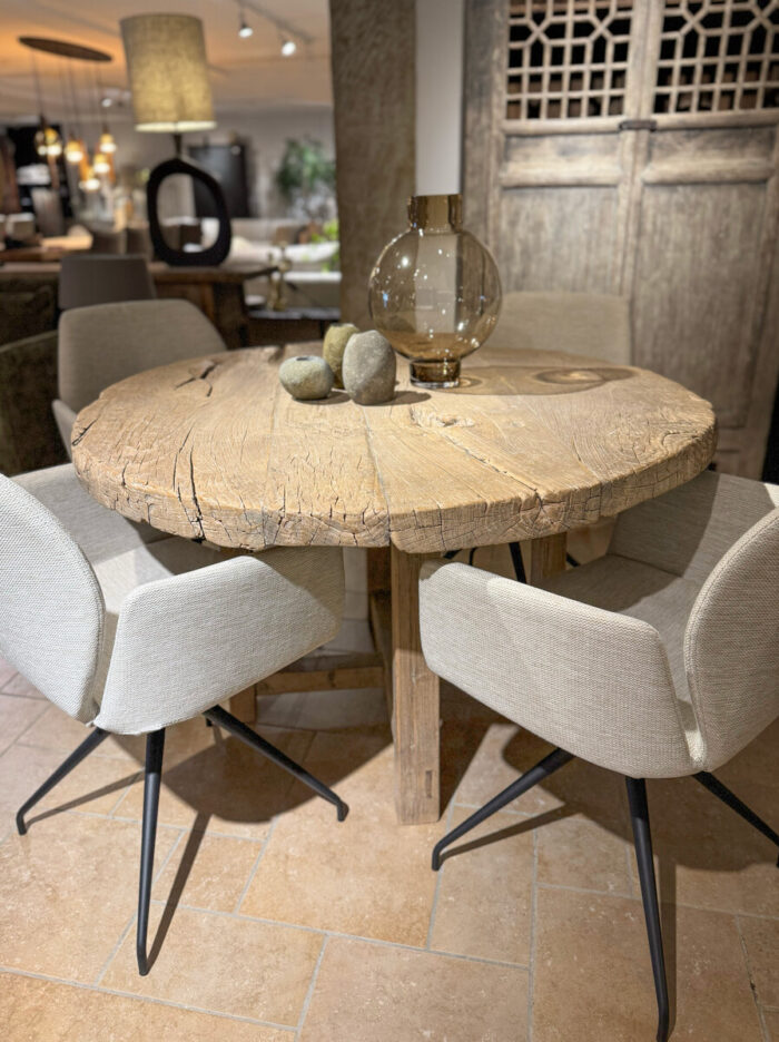 Wooden table with modern chairs