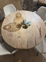 Round wooden table with decoration