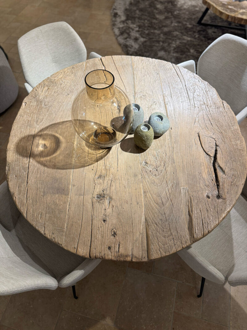 Round wooden table with decoration