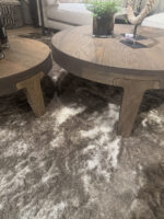Tables on a rug.