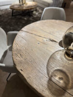 Wooden table with glass vase