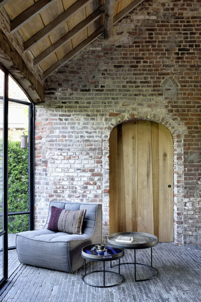 Modern living room with brick wall