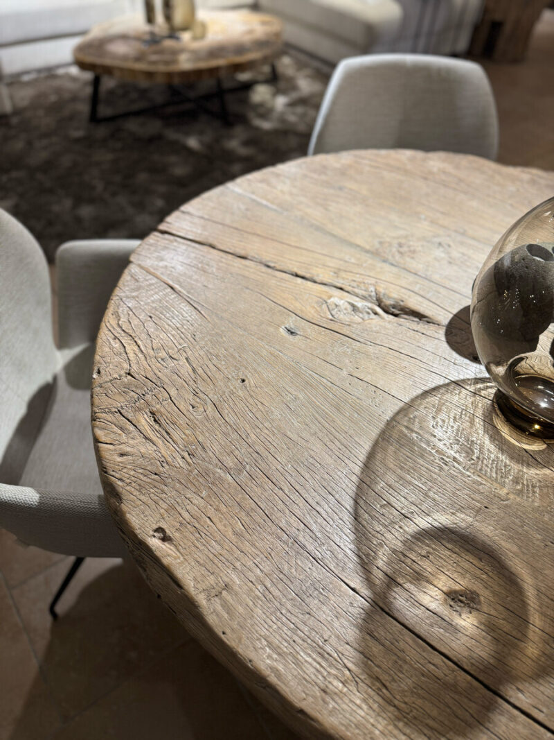 Wooden table with glass vase