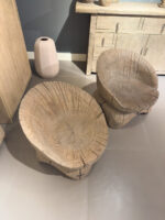 Two wooden bowls on the floor
