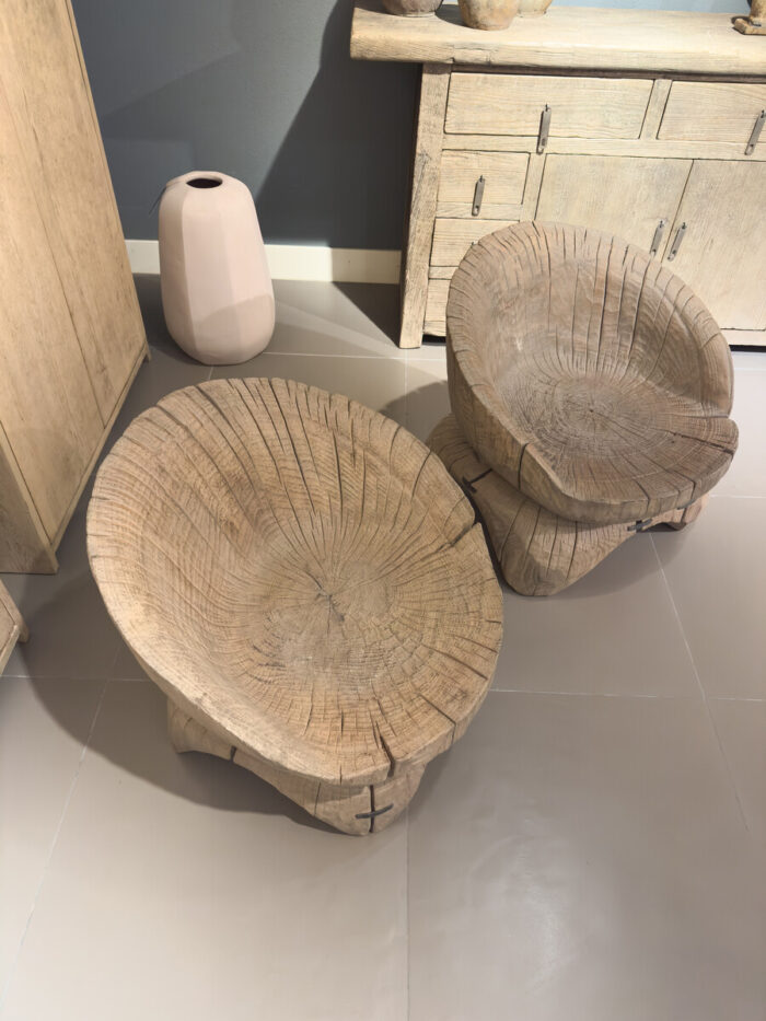 Two wooden bowls on the floor