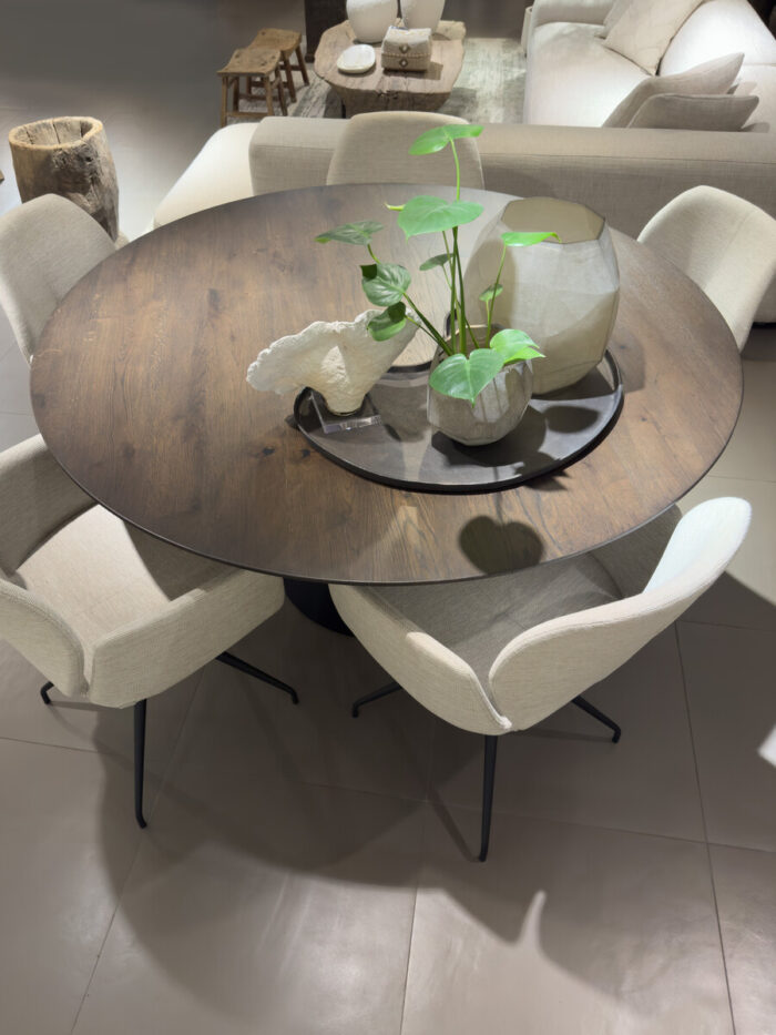 Round table with plants and chairs