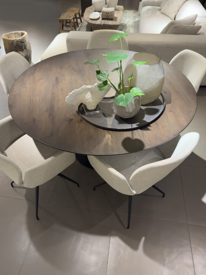 Round table with plants and chairs