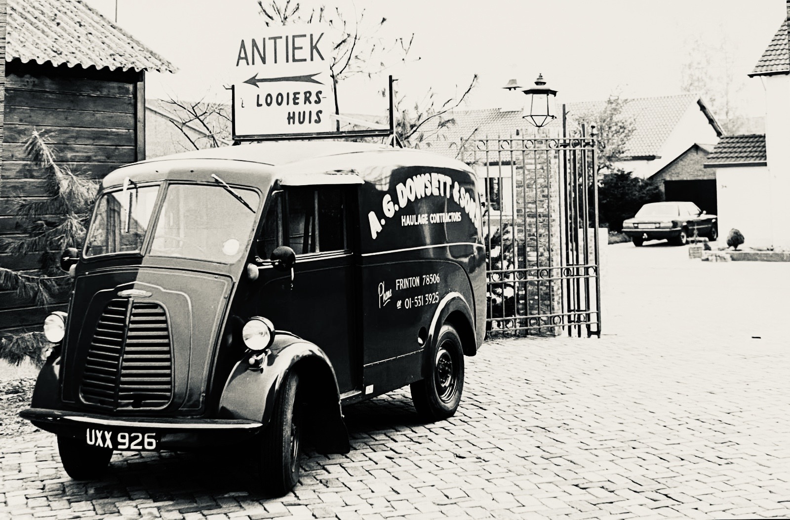 Old van at antique shop entrance