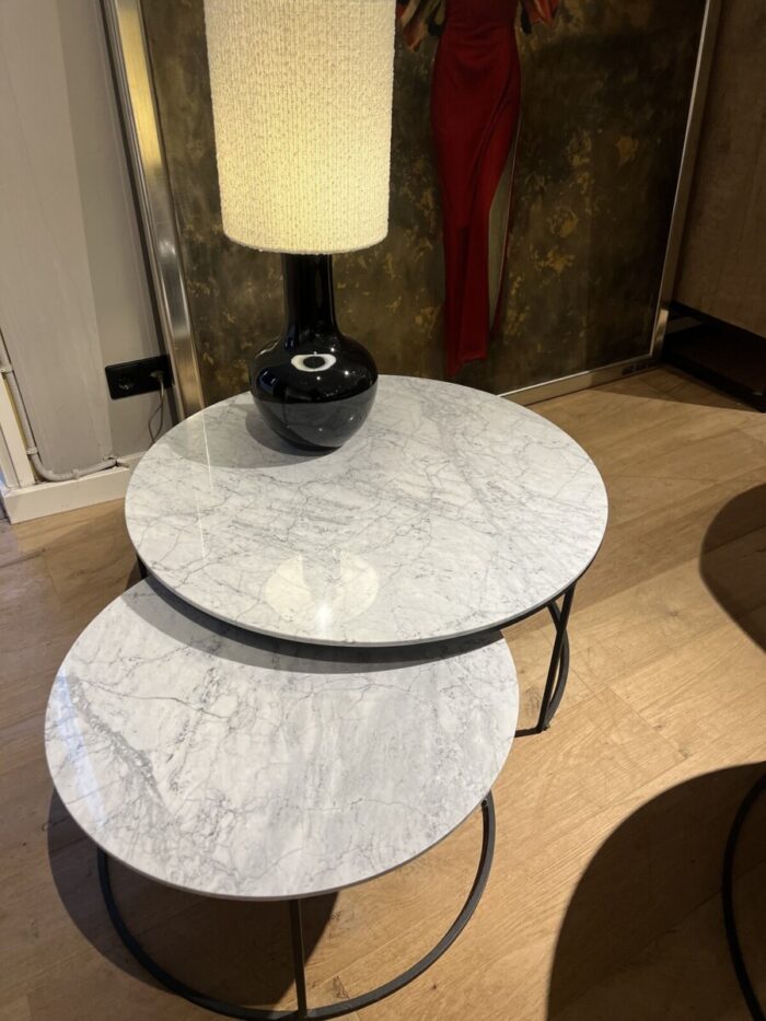 Tables with marble tops and lamps
