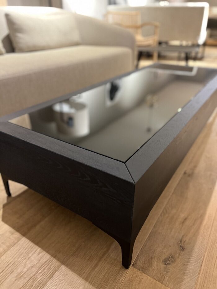 Black coffee table with glass top