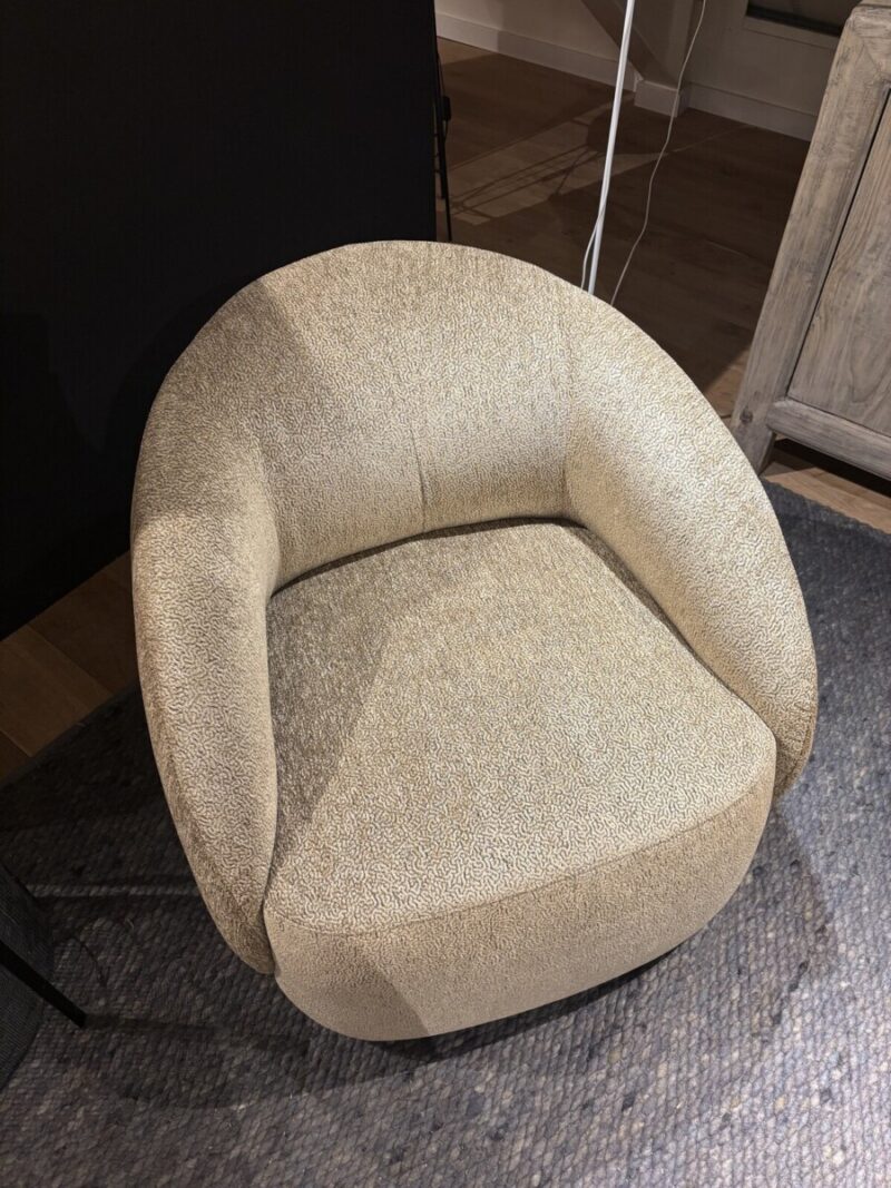 Round beige armchair with texture