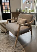 Modern chair with cushion and decoration