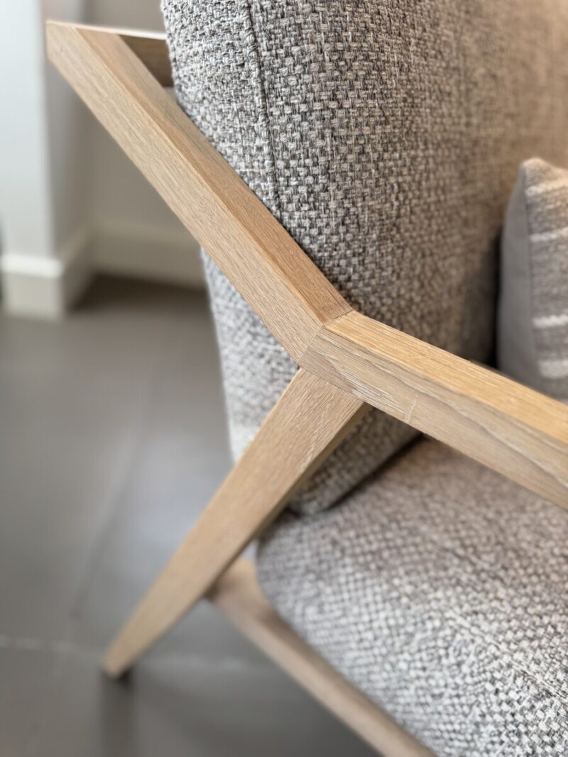 Wooden chair with grey upholstery