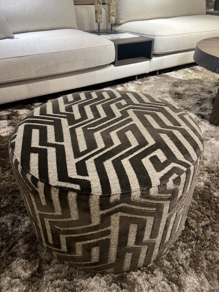 Round pouffe with geometric pattern