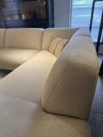 Modern beige sofa with cushion