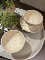 Two bowls on a tray.