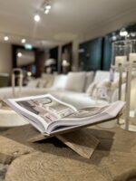 Open book on wooden table