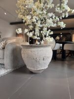 Vase with flowers in modern space
