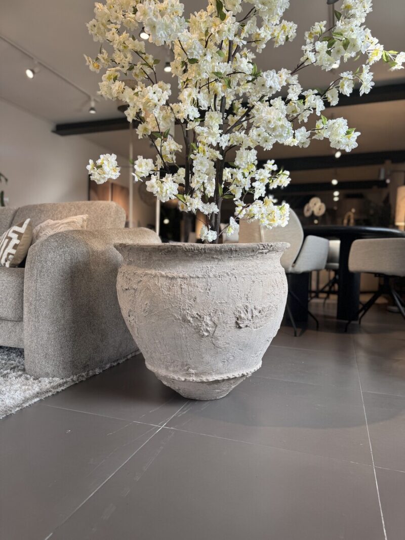Vase with flowers in modern space