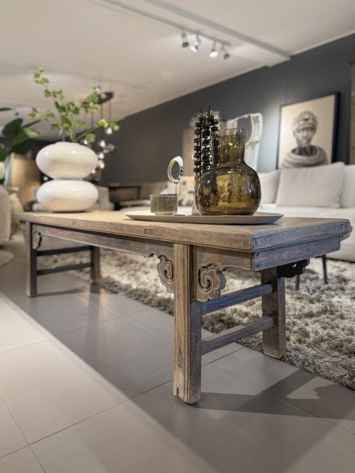 Table with exceptional wood carving of cloud ornaments